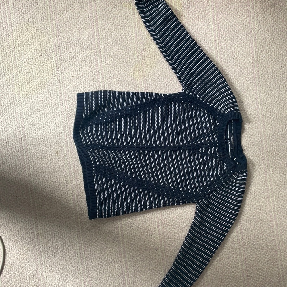 Navy blue and white knitted sweater